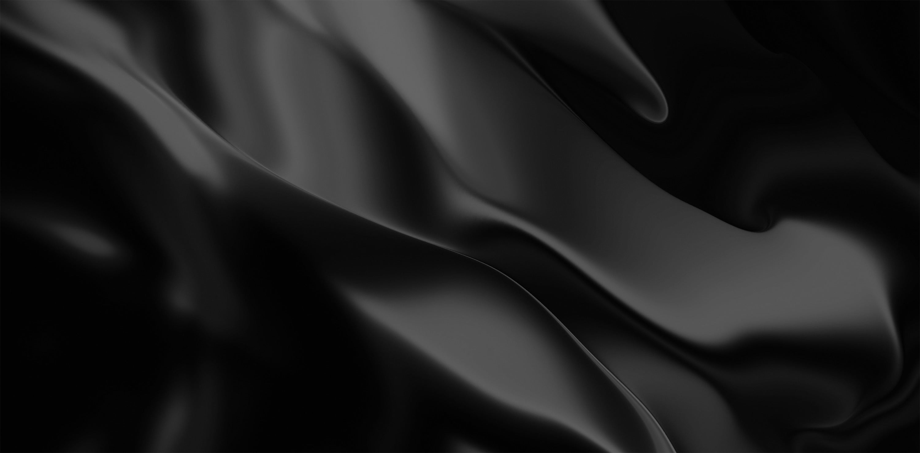 Close-up of black fabric with folds and creases