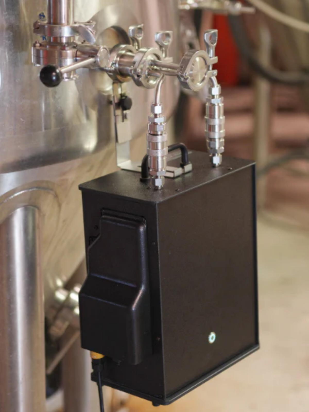 Control panel with levers on a a brew tank.