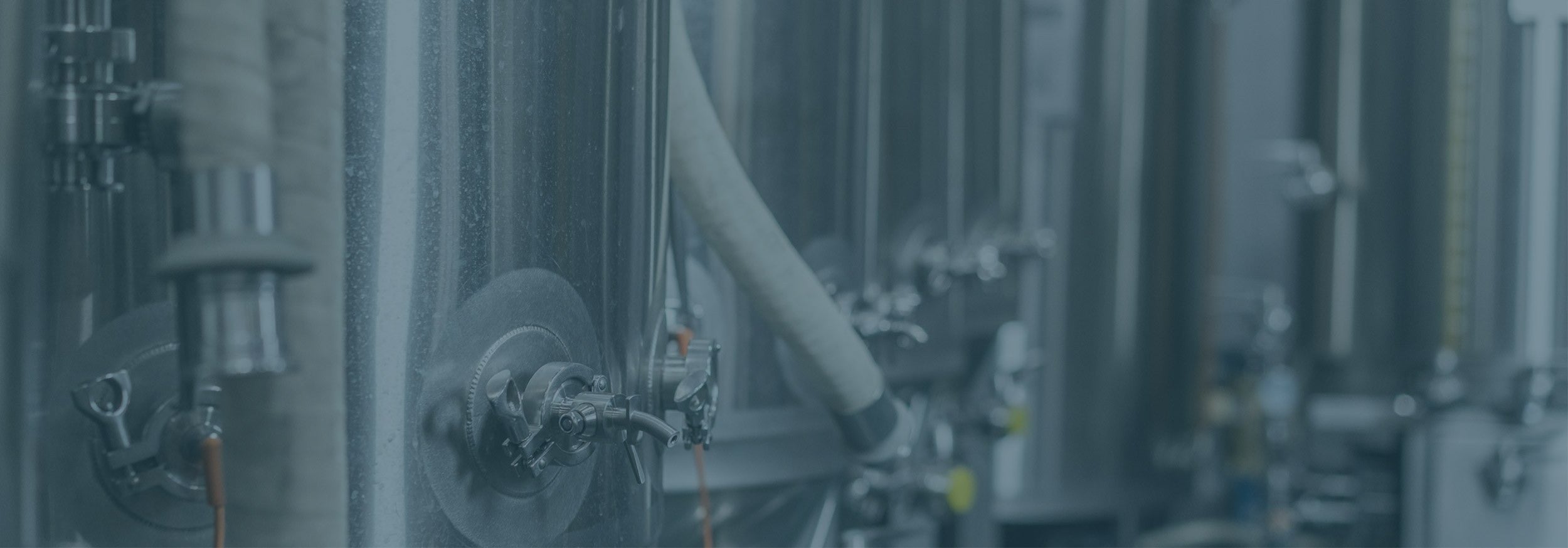 Close-up of tanks in a brewery.