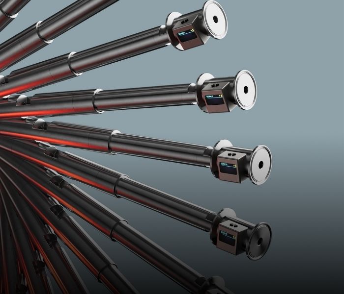 Set of metal rods with connectors on a gray background